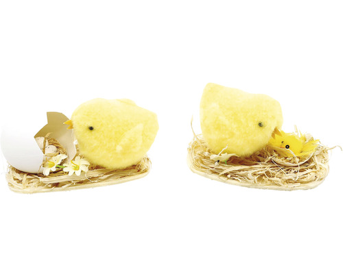 Kuřátko se skořápkou žluté 10 x 6 x 7 cm, různé druhy Dvě figurky kuřátek v hnízdech s květinami a vejci jako velikonoční dekorace.