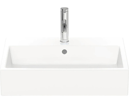 Bílé keramické umyvadlo s baterií