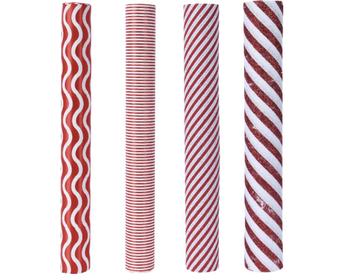 Čtyři role balicího papíru s různými vzory