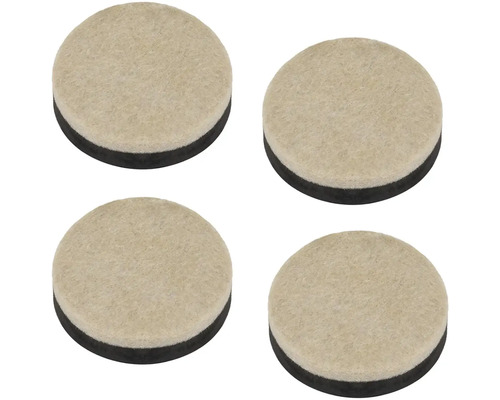Čtyři plstěné kluzáky na nábytek o průměru přibližně 25 milimetrů.