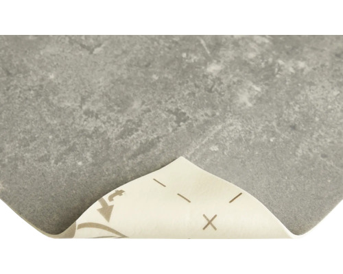 Samolepicí podlahová dlaždice se vzhledem kamene a odnímatelnou ochrannou fólií.