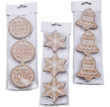 Balení s vánočními ozdobami ve tvaru koulí, hvězd a zvonků