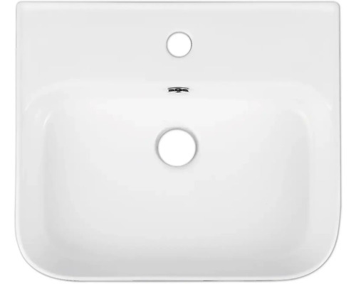 Pohled shora na bílé keramické umyvadlo s otvorem pro kohoutek a přepadem