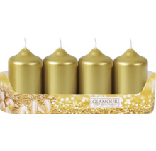 Čtyři zlaté sloupové svíčky v balení na Vánoce.