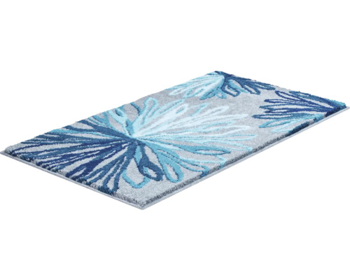 Šedý chlupatý koberec s květinovým vzorem