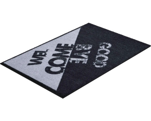 Rohožka s nápisem Vítejte a Sbohem