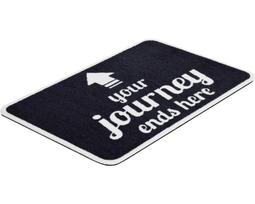 Rohožka se šipkou a nápisem Your journey ends here