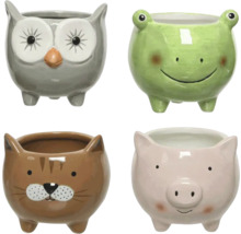 Čtyři květináče ve tvaru zvířat: sova, žába, kočka a prase.