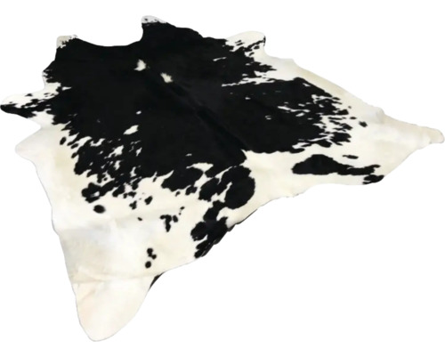 Černobílý skvrnitý koberec z kravské kůže