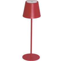 Červená stolní lampa se stínidlem a kulatou základnou