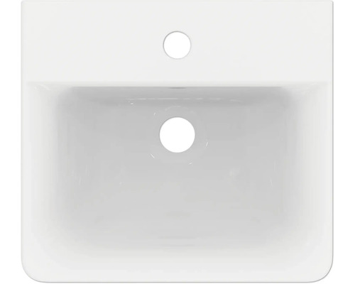 Pohled shora na keramické umyvadlo s otvorem pro vodovodní baterii