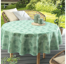 Kulatý stůl se zeleným ubrusem s rostlinným vzorem na terase