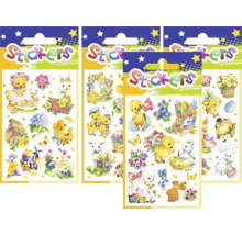 Několik balení samolepek s velikonočními motivy, jako jsou kuřátka, králíci a květiny