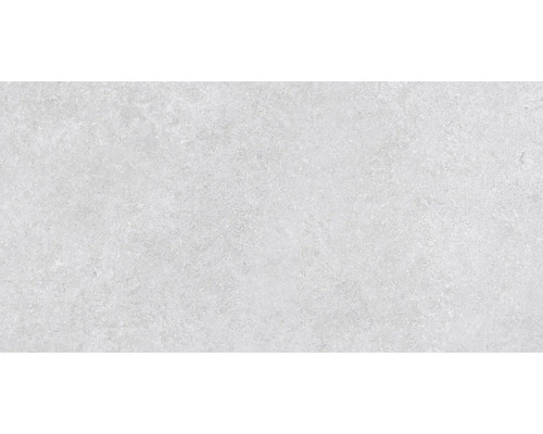 Světlá keramická dlaždice s matným povrchem