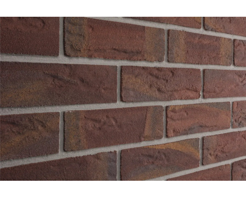 Elabrick obkladový kámen pásek Kiel 24 x 7,1 cm Vnější Detailní záběr obkladu stěny s cihlovým vzhledem