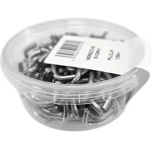 Drátěné sponky v průhledné dóze