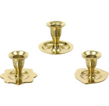 Tři zlaté svícny různých tvarů