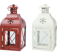 Dvě lucerny z kovu a skla se vzorem sněhových vloček