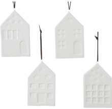 Čtyři bílé ozdoby domu s okny a hvězdami na Vánoce