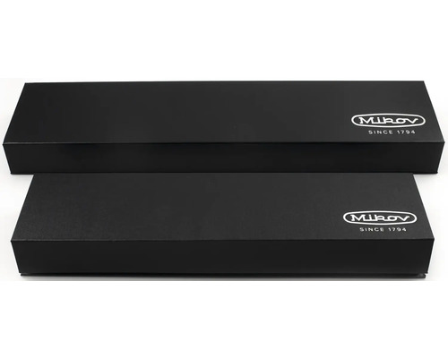 Dvě černá balení produktů Mikov