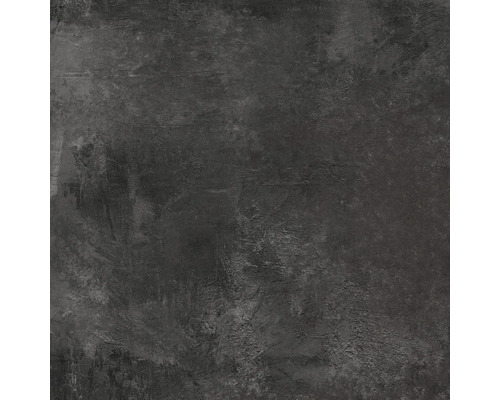 Detail tmavě šedé nástěnné dlaždice s matným povrchem a vzhledem betonu.