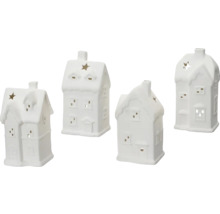 Čtyři bílé keramické domky jako držáky na čajové svíčky