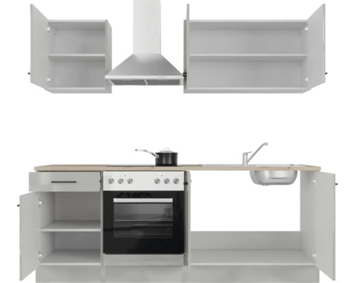 Moderní kuchyňská linka s dřezem, sporákem, digestoří a úložným prostorem