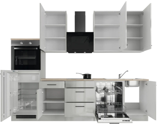 Kompletní kuchyně se spotřebiči, včetně chladničky, trouby, myčky a odsavače par.