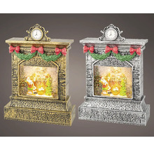 Dva dekorativní krby s hodinami, girlandou, mašlemi a sněhovou koulí