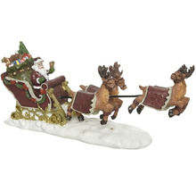 Vánoční dekorace s Santa Clausem v saních se soby