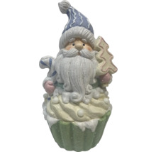 Figurka Santa Clause na podstavci ve tvaru dortíku