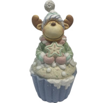 Dekorativní figurka losa ve tvaru muffinu s hvězdou