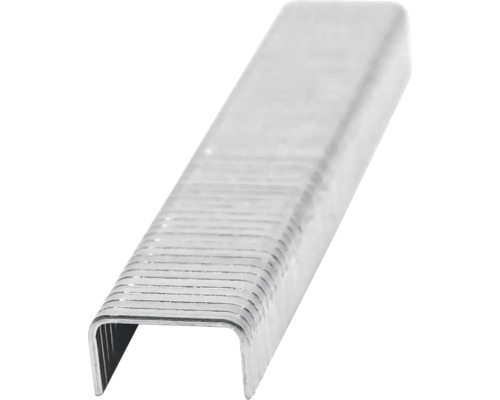 Detailní pohled na řadu sponek pro sešívačku.