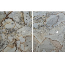 Čtyři různé vzory dlaždic s mramorovým vzhledem.