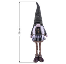 Dekorativní vánoční skřítek s copy, sukní a špičatou čepicí, výška 108 centimetrů.