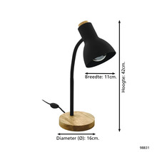 Stolní lampa z kovu s dřevěnou základnou. Výška 42 centimetrů, šířka stínidla 11 centimetrů, průměr základny 16 centimetrů.