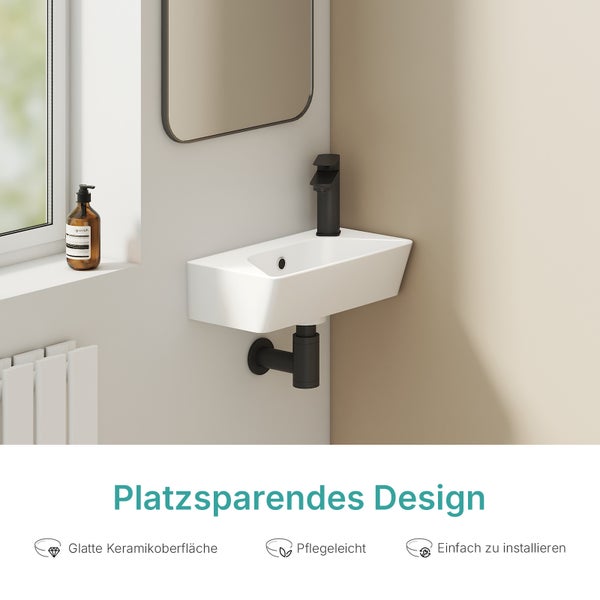 Nástěnné umyvadlo z keramiky s baterií a sifonem v moderní koupelně, prostorově úsporný design, snadná údržba a jednoduchá instalace.