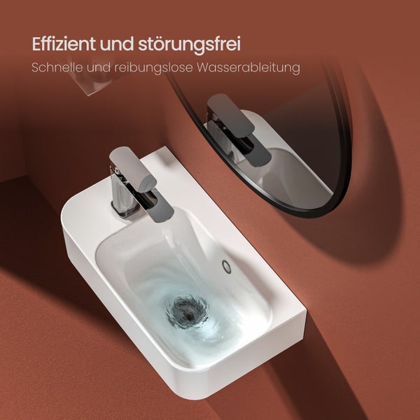 Moderní umyvadlo s vodovodní baterií a zrcadlem pro efektivní design koupelny