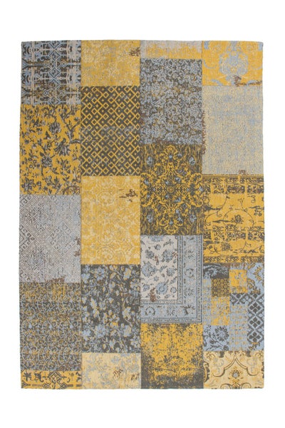 Obdélníkový tkaný koberec s patchworkovým designem s různými ornamenty a vzory ve vintage stylu