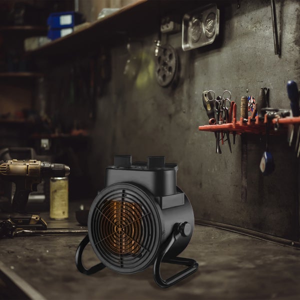 Teplovzdušný ventilátor pro dílenské použití na pracovní lavici