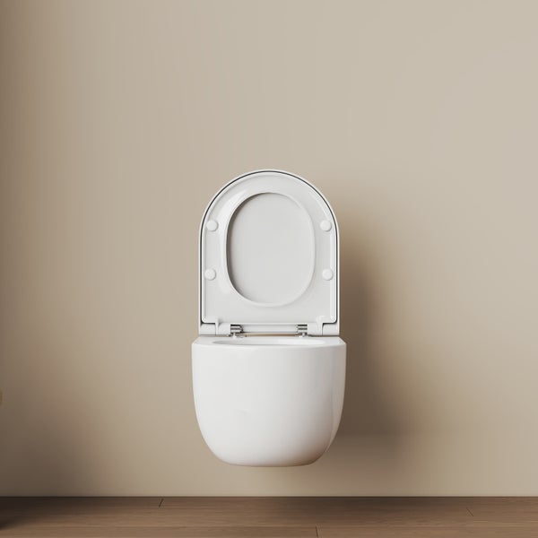 Závěsné WC z keramiky se sedátkem před jednoduchou stěnou