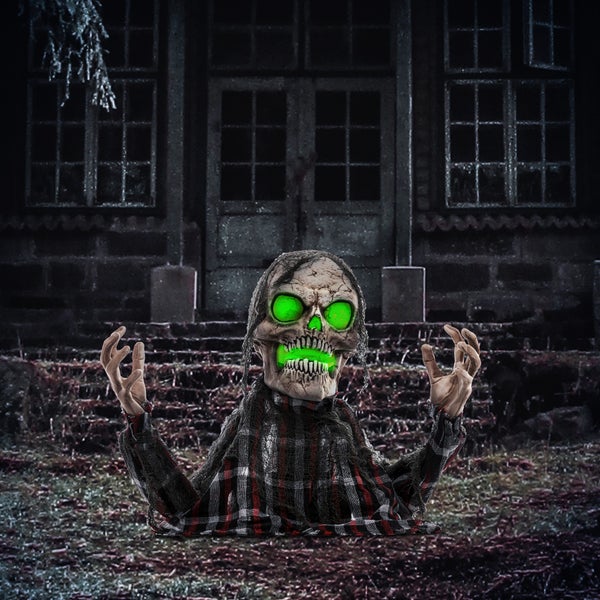 Dekorativní halloweenská figurka s lebkou a svítícíma očima jako zahradní dekorace