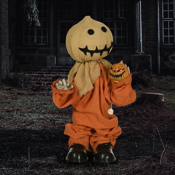 Halloweenská dekorační figurka s dýní a kostýmem z pytloviny