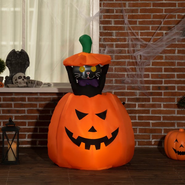 Nafukovací halloweenská dekorace s kočkou ve tvaru dýně.