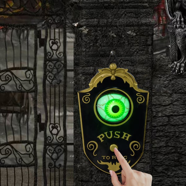 Halloweenský zvonek s oční bulvou a prstem stisknutím tlačítka
