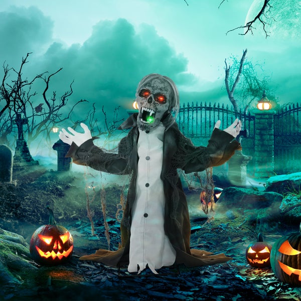 Halloweenská scéna s hřbitovem, dýněmi a animovanou zombie